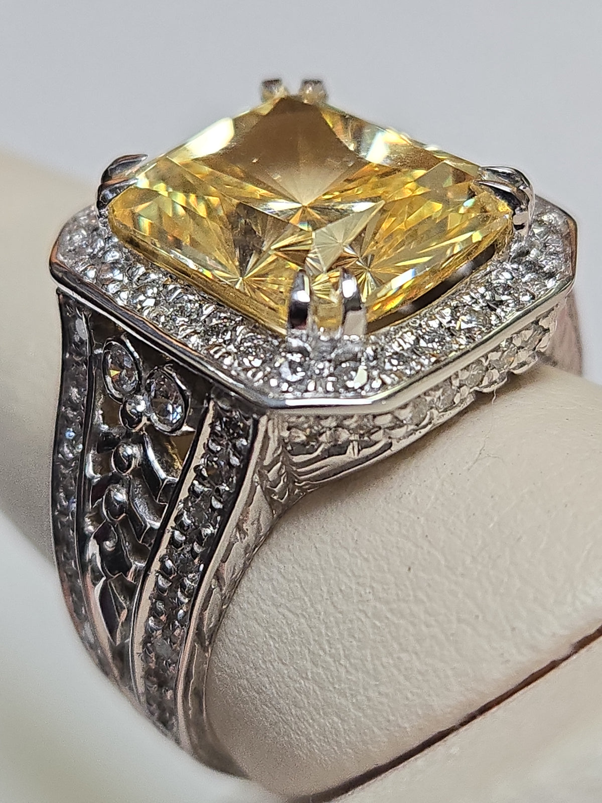 14K gold ring with emerald-cut simulated Lannyte diamond, featuring a 15.6g band, crafted by Chique Jewelry.