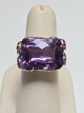14K white gold ring with a rectangular amethyst gemstone, featuring elegant design and craftsmanship by Chique Jewelry