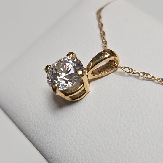 14K gold pendant with round simulated Lannyte diamond, lightweight design, crafted by Chique Jewelry.