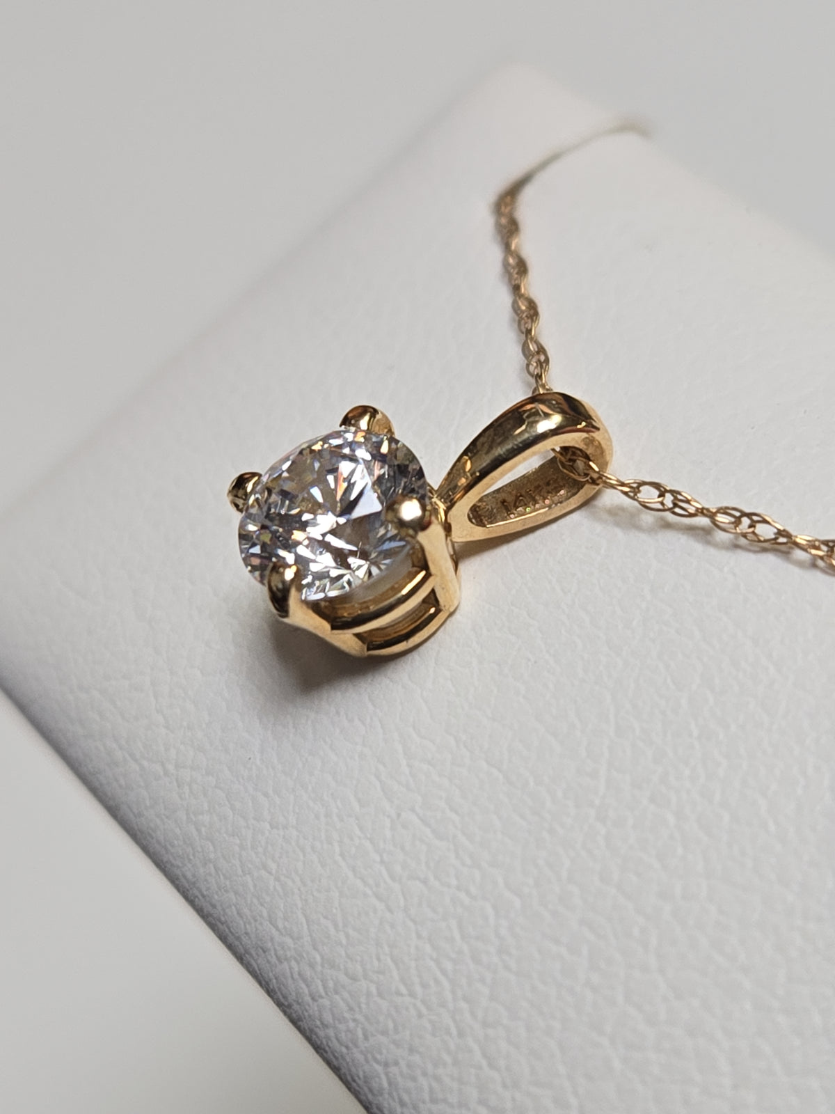 14K gold pendant with round simulated Lannyte diamond, lightweight design, crafted by Chique Jewelry.