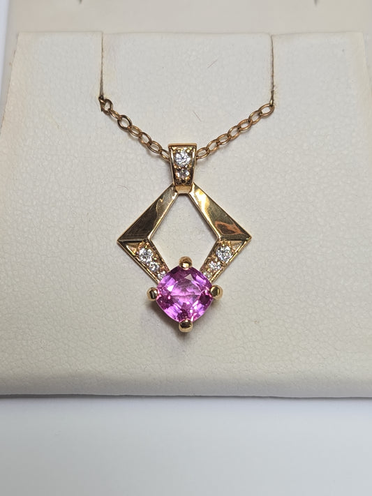 14K gold pendant featuring a 1.3ct cushion-cut pink sapphire, crafted by Chique Jewelry, with a total weight of 2.4 grams.