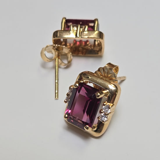 14K gold pendant with emerald-cut rubellite gemstone, weighing 3.5 grams, from Chique Jewelry.