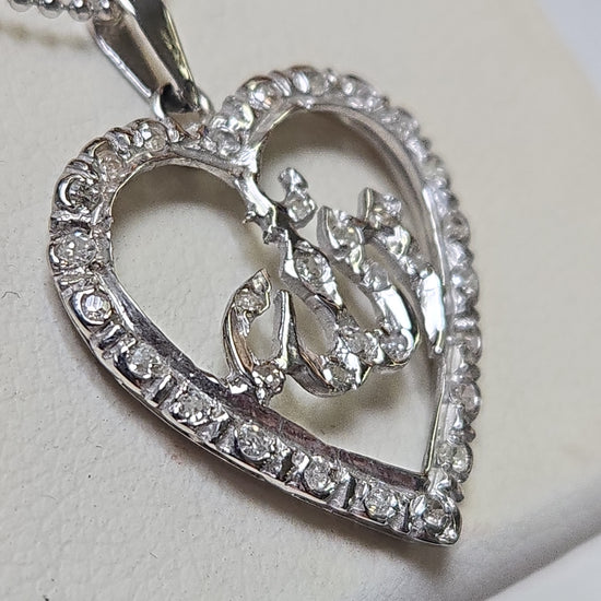 18K white gold Allah pendant with round diamonds, elegant jewelry piece weighing 2 grams, designed by Chique Jewelry.