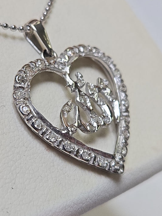 18K white gold Allah pendant with round diamonds, elegant jewelry piece weighing 2 grams, designed by Chique Jewelry.