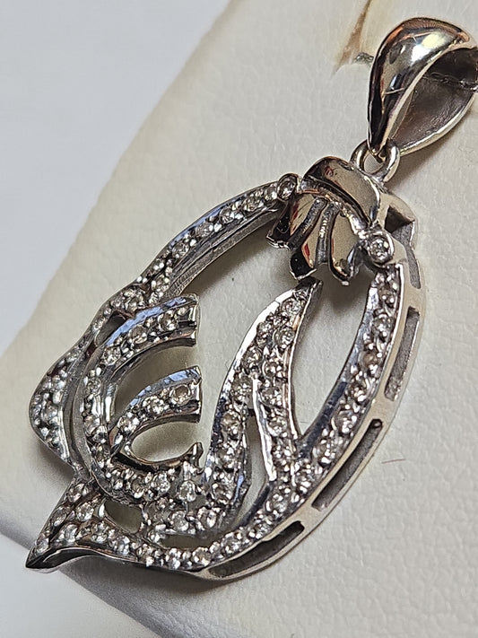 18K white gold Allah pendant with round diamonds, elegant jewelry piece by Chique Jewelry, showcasing intricate design and sparkling stones.
