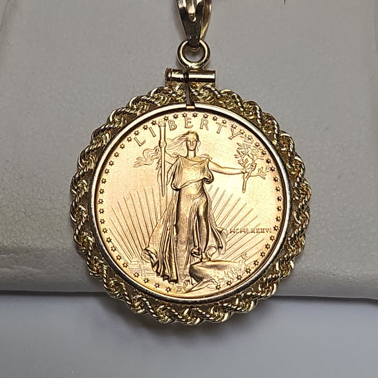 14K gold American Gold Eagle 1986 1/4 oz coin pendant featuring detailed gold eagle design, crafted by Chique Jewelry.