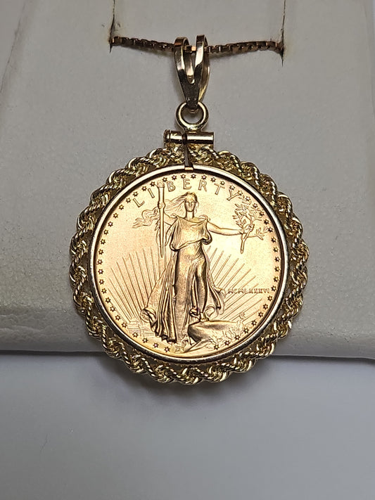 14K gold American Gold Eagle 1986 1/4 oz coin pendant featuring detailed gold eagle design, crafted by Chique Jewelry.