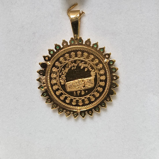 14K gold Mohammad Reza Shah Pahlavi coin pendant with 0.5ct round emeralds, crafted by Chique Jewelry, weighing 12.3 grams.