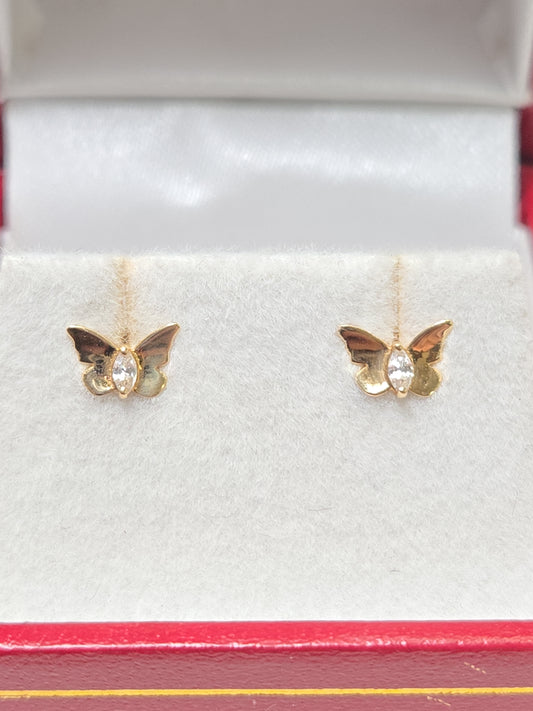 14K gold stud earrings with round cubic zirconia stones, featuring a simple and elegant design by Chique Jewelry.