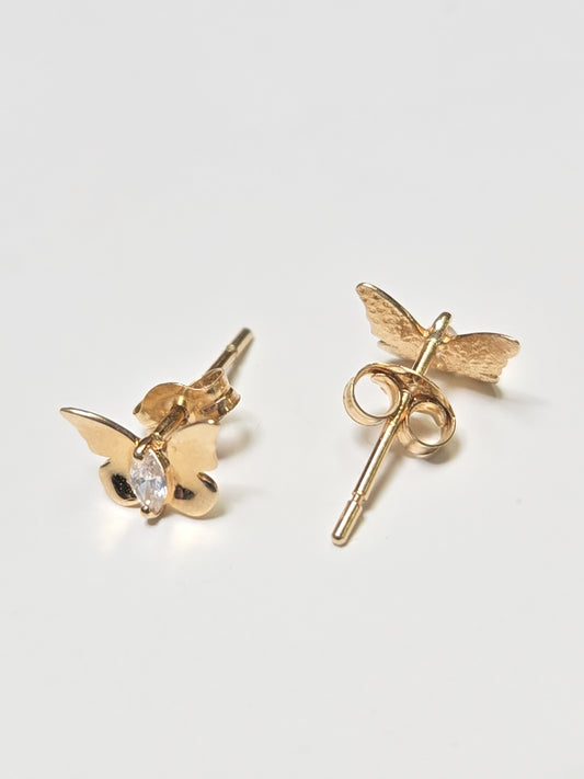 14K gold stud earrings with round cubic zirconia stones, featuring a minimalist design and a total weight of 0.4 grams.