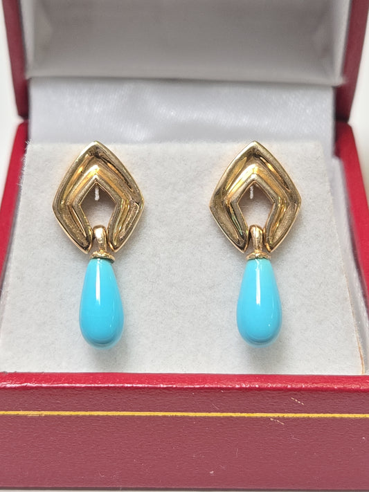 14K gold drop earrings featuring pear-shaped turquoise stones, weighing 2.7g, from Chique Jewelry.