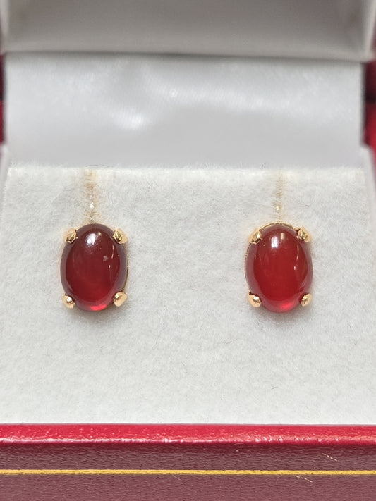 14K gold oval agate stud earrings by Chique Jewelry, lightweight and elegant jewelry accessory with polished gemstone.