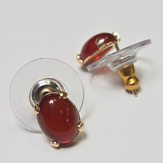 14K gold stud earrings with oval agate stones, featuring a sleek design and 1.2g weight, by Chique Jewelry.