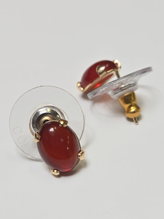 14K gold stud earrings with oval agate stones, featuring a sleek design and 1.2g weight, by Chique Jewelry.