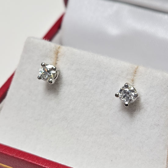 14K white gold stud earrings featuring 0.3ct round lab-created diamonds from Chique Jewelry.
