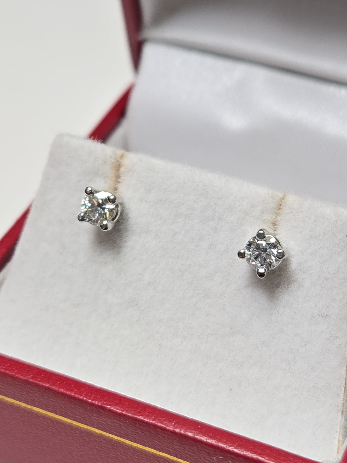 14K white gold stud earrings featuring 0.3ct round lab-created diamonds from Chique Jewelry.