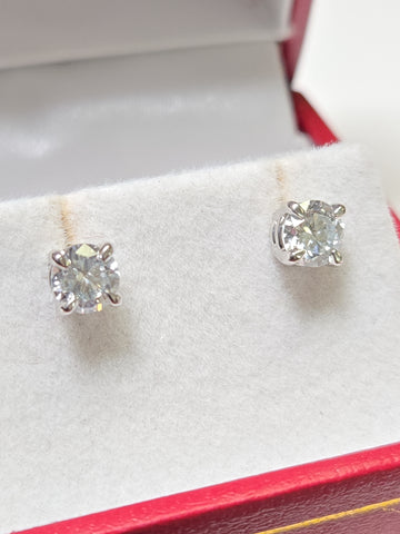 14K white gold stud earrings featuring 0.95ct round lab-created diamonds from Chique Jewelry, showcased on a white background.