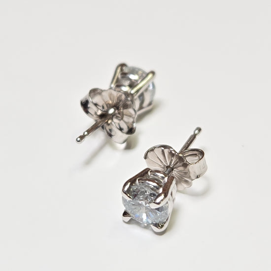 14K white gold stud earrings with 0.95ct round lab-created diamonds from Chique Jewelry, showcasing elegant jewelry design.