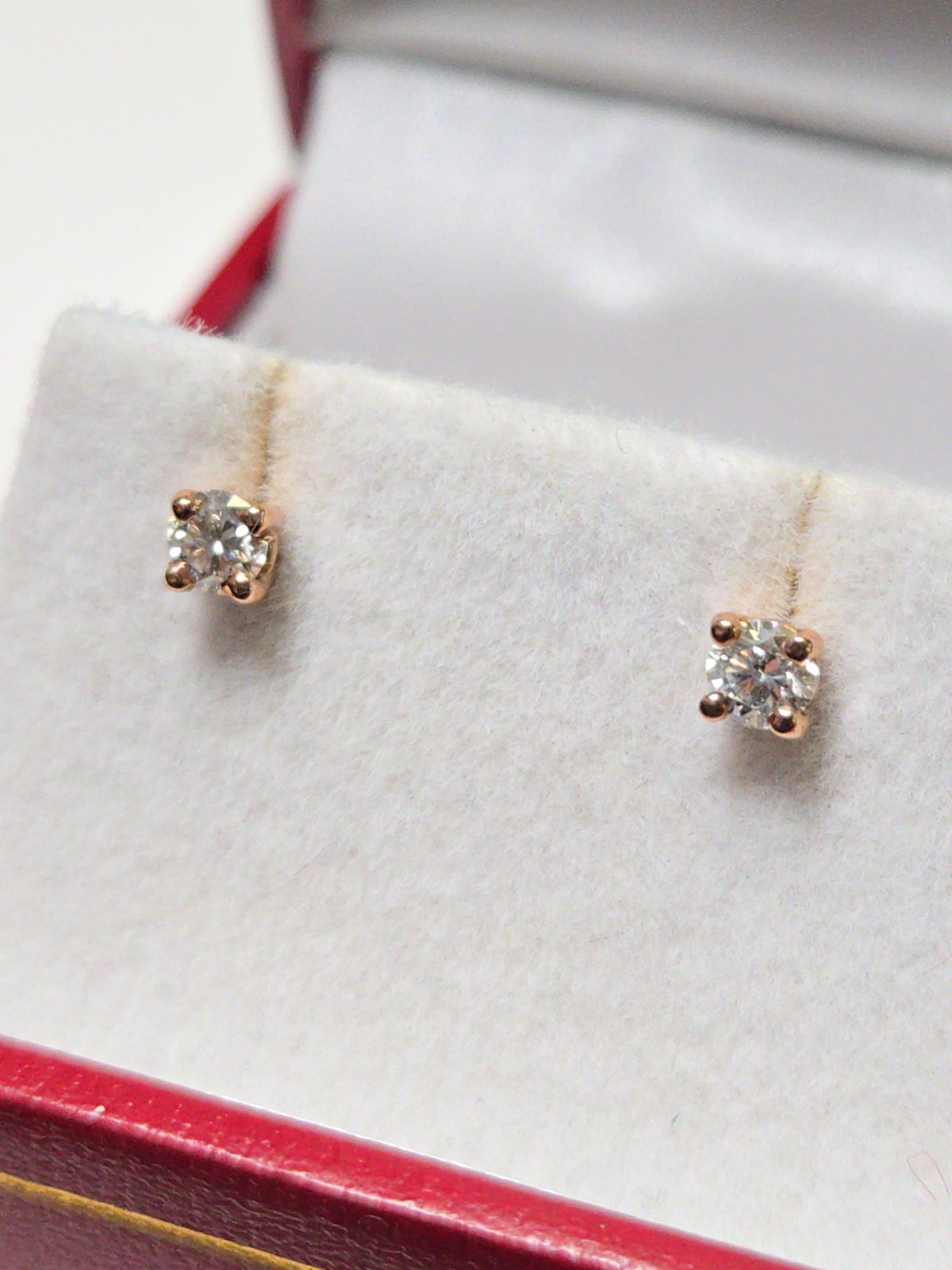 14K rose gold stud earrings with 0.26ct round diamonds, lightweight and elegant jewelry by Chique Jewelry.