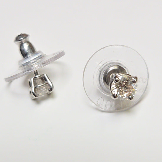 14K white gold stud earrings with 0.66ct round diamonds from Chique Jewelry, featuring a sleek, elegant design.