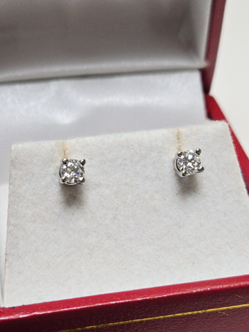 14K white gold stud earrings with 0.3ct round lab-created diamonds from Chique Jewelry, showcasing elegant jewelry design.