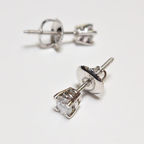 14K white gold stud earrings with 0.3ct round lab-created diamonds, featuring a sleek and elegant design by Chique Jewelry.