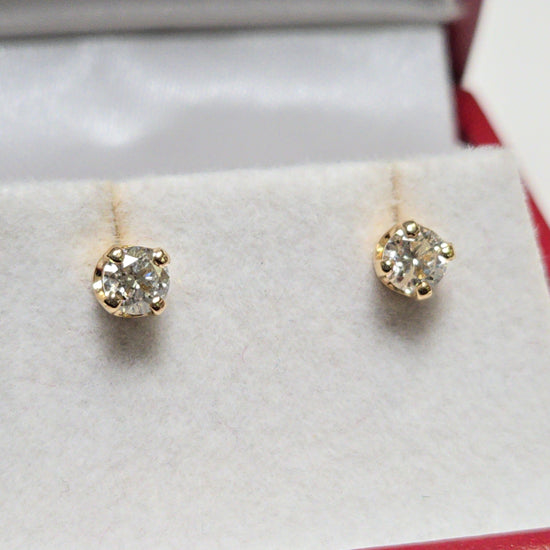14K gold stud earrings with 0.48ct round diamonds from Chique Jewelry, showcasing elegant jewelry design and sparkling gemstones.