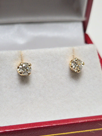 14K gold stud earrings with 0.48ct round diamonds from Chique Jewelry, showcasing elegant jewelry design and sparkling gemstones.