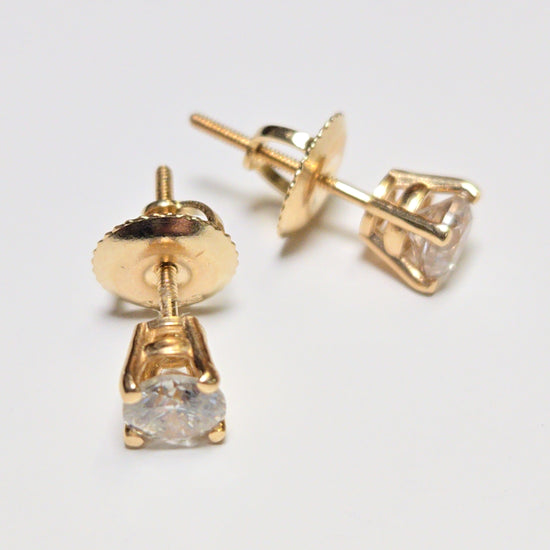 14K gold stud earrings with 0.5ct round diamonds from Chique Jewelry, showcasing elegant jewelry design.
