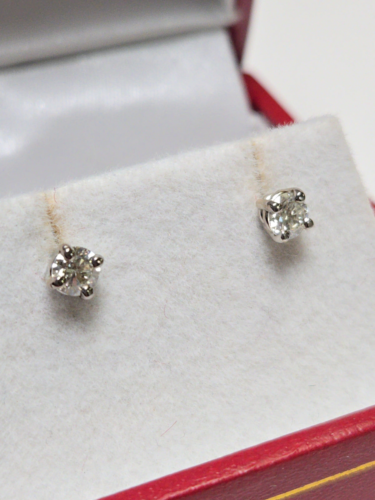 14K white gold stud earrings with 0.36ct round diamonds, featuring a classic and elegant jewelry design.