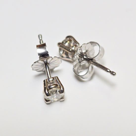 14K white gold stud earrings with 0.36ct round diamonds, showcasing elegant jewelry craftsmanship by Chique Jewelry.