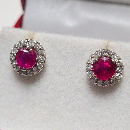 14K white gold two-stone ruby stud earrings with 0.97ct round rubies, crafted by Chique Jewelry.