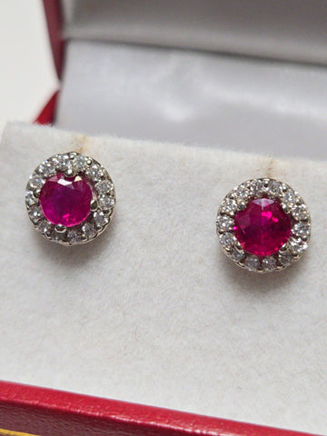 14K white gold two-stone ruby stud earrings with 0.97ct round rubies, crafted by Chique Jewelry.