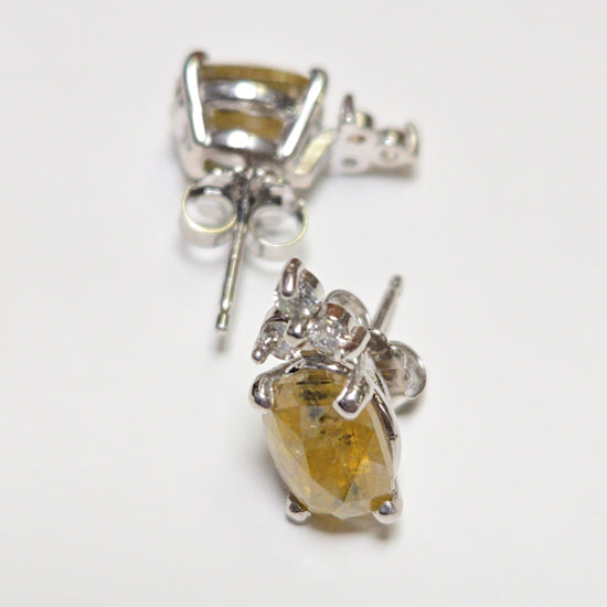 14K white gold stud earrings with 2.02ct rose-cut yellow diamonds, featuring a classic design and 2.4g weight.