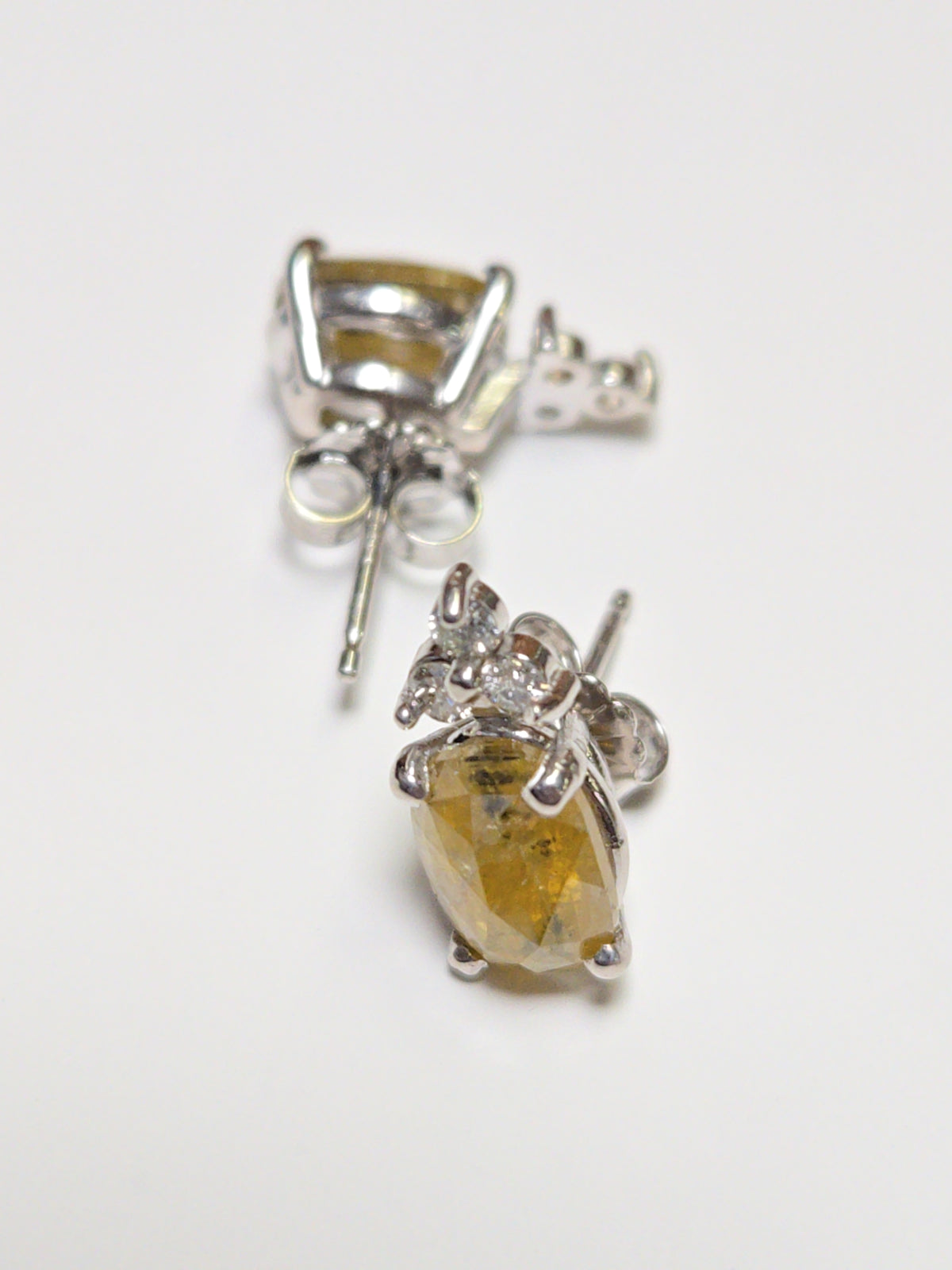 14K white gold stud earrings with 2.02ct rose-cut yellow diamonds, featuring a classic design and 2.4g weight.