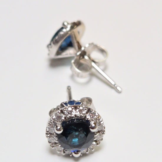 14K white gold two-stone stud earrings with 1.56ct round blue sapphires from Chique Jewelry.