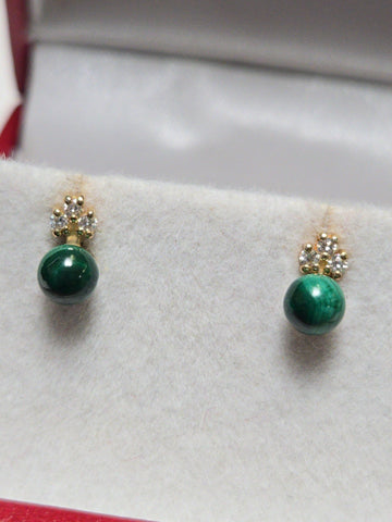 14K rose gold stud earrings with round malachite gemstones from Chique Jewelry, showcasing elegant jewelry design.