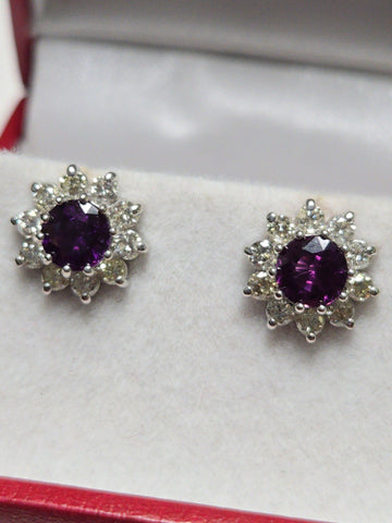 14K white gold two-stone stud earrings featuring 1.7ct round red sapphires from Chique Jewelry.