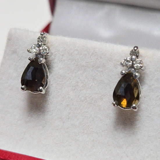 14K white gold stud earrings with 0.73ct rose-cut chocolate diamond, featuring elegant jewelry design.
