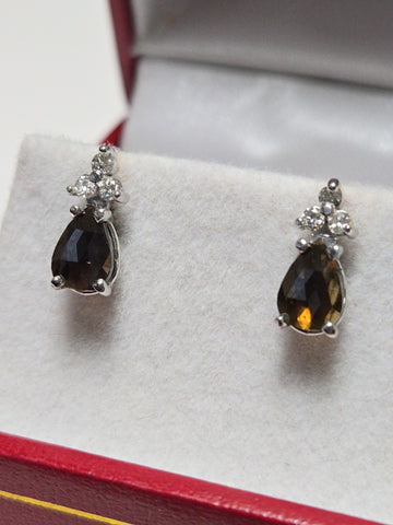 14K white gold stud earrings with 0.73ct rose-cut chocolate diamond, featuring elegant jewelry design.
