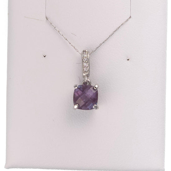 14k white gold pendant with 1.35 ct lab-created round alexandrite showing extreme color change, from Chique Jewelry.