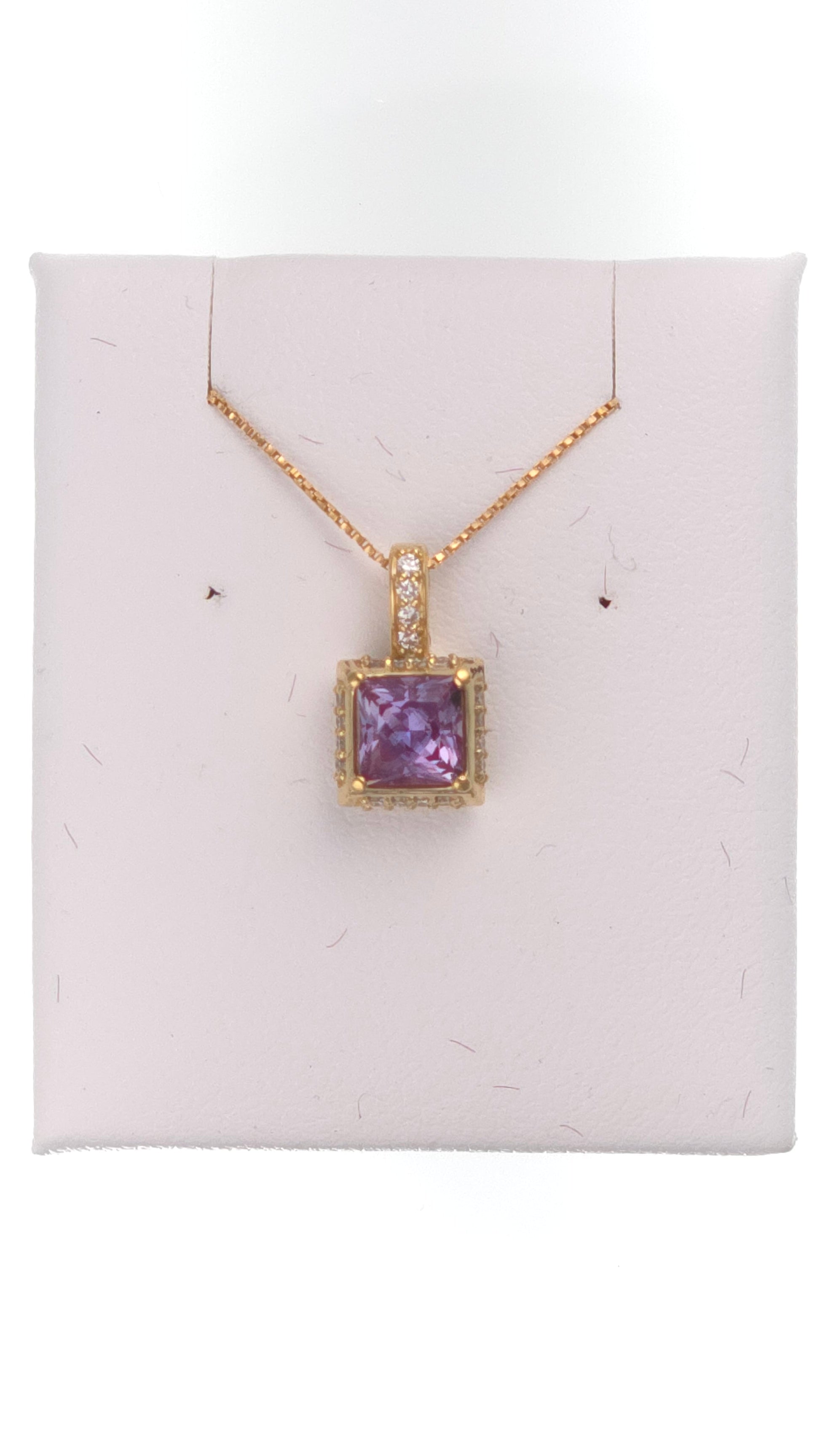 14k gold pendant with 1.05 ct lab-created princess Alexandrite, showcasing a stunning, vibrant purple-blue gemstone.