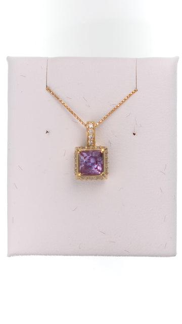 14k gold pendant with 1.05 ct lab-created princess Alexandrite, showcasing a stunning, vibrant purple-blue gemstone.