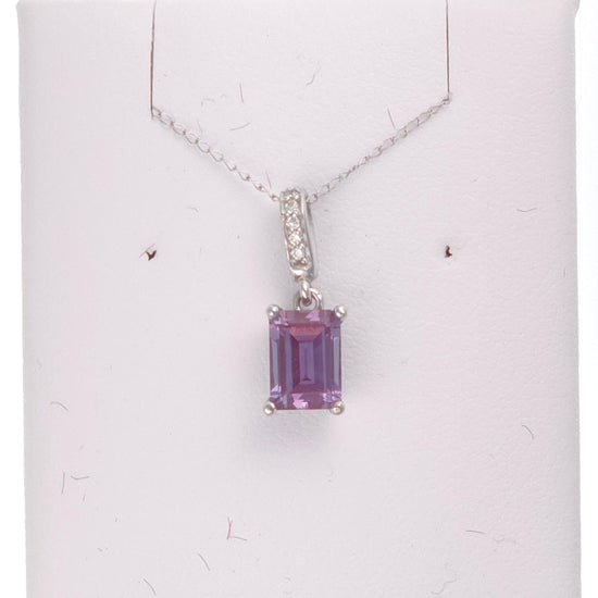 14k white gold pendant featuring a 1.2ct lab-created emerald alexandrite gemstone, elegant jewelry piece with intricate design.