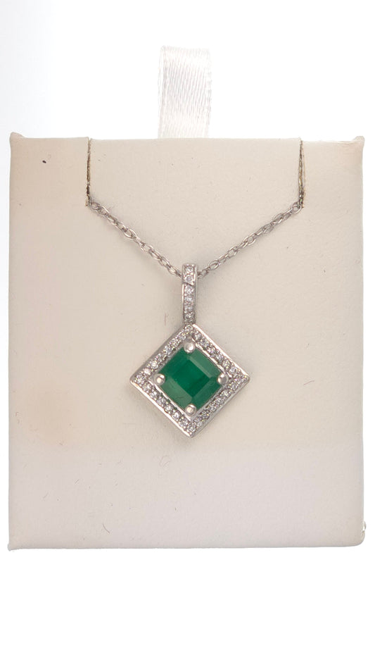 14k white gold pendant featuring a 1.28 ct square emerald VS1 with 0.20 ct side diamonds by Chique Jewelry.