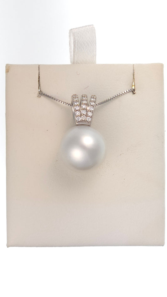 14k white gold pendant featuring a 12mm South Sea white pearl and 0.10 carats of side lab diamonds by Chique Jewelry.