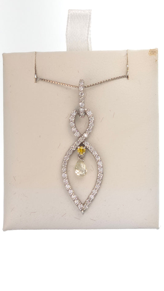 14k white gold pendant featuring a 0.3 ct briolette diamond and side diamonds with a 0.05 ct yellow diamond accent.