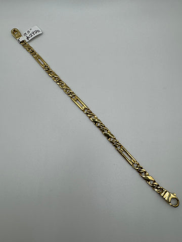 14k gold Figaro bracelet, 7.5 inches long and 4.9mm wide, with a polished finish, weighing 12.3 grams, by Chique Jewelry.