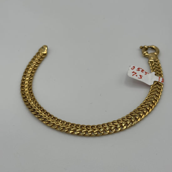 7.5-inch 7mm gold mesh bracelet by Chique Jewelry, showcasing a sleek 14k gold design with a 7.5g weight.