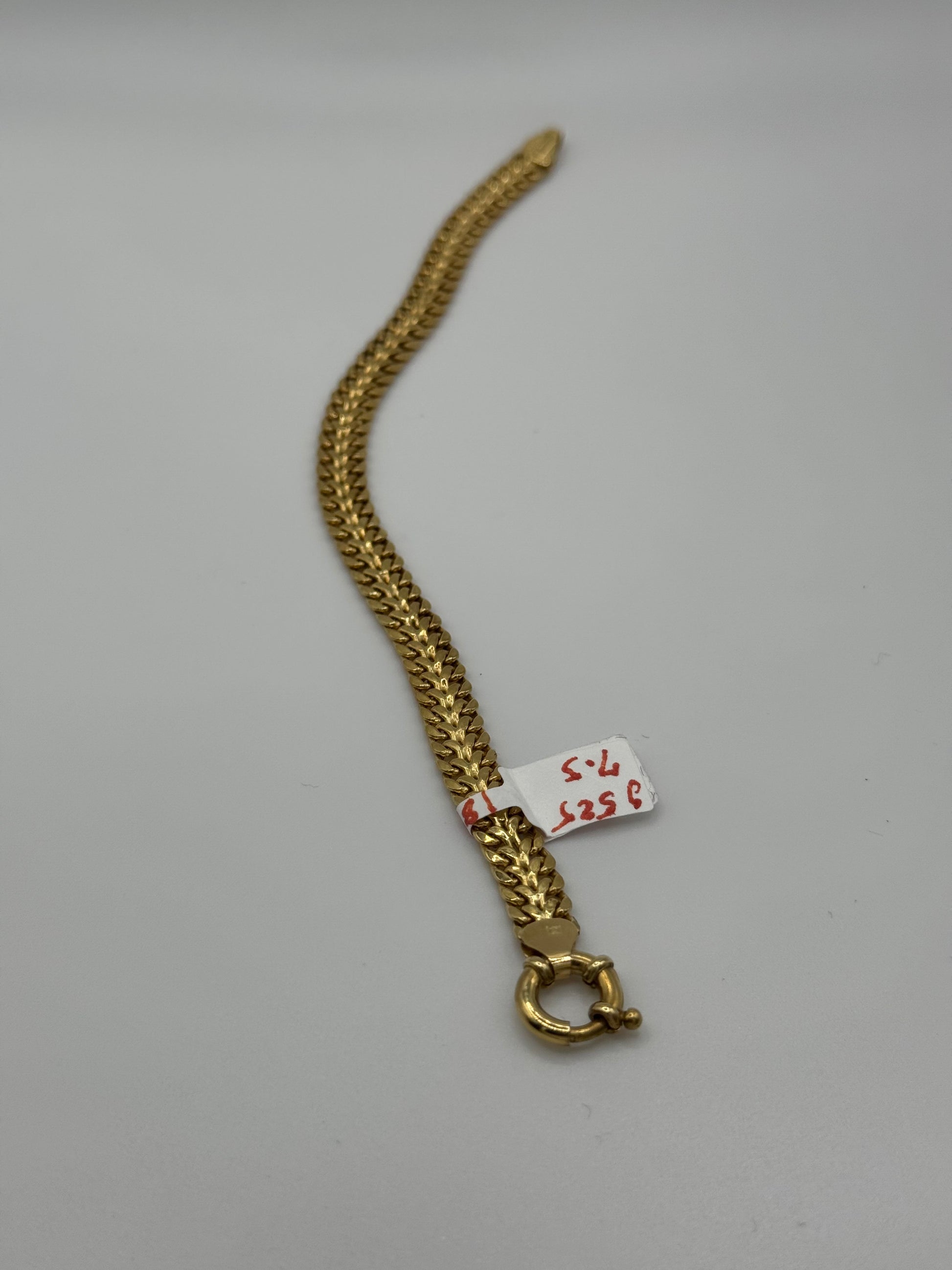 7.5-inch 14k gold mesh bracelet with 7mm width, featuring a sleek and shiny design from Chique Jewelry.